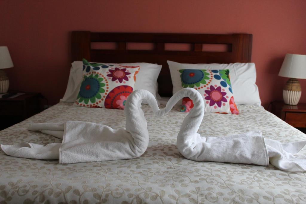 Hotel bed with bathrobe